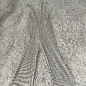 Full length open back jump suit